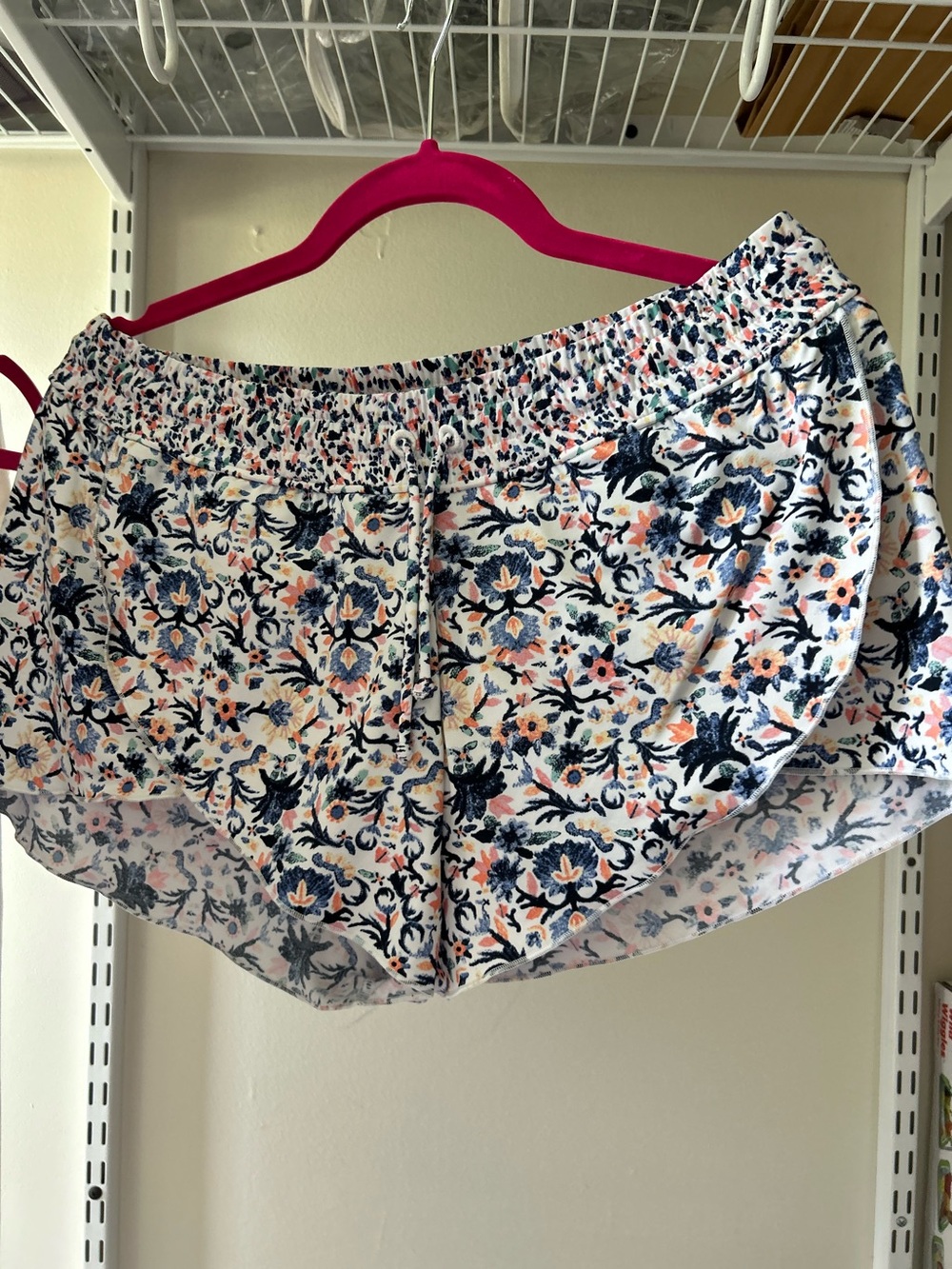 Athleta lined Shorts with Navy and Peach Floral Print